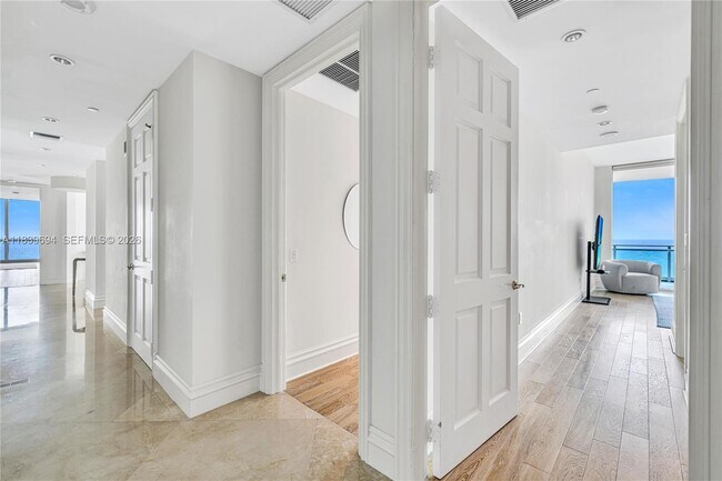 Building Photo - 10295 Collins Ave