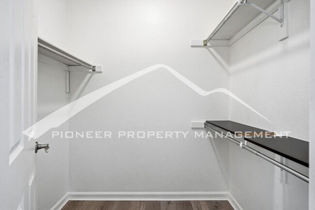 Building Photo - Spacious Condo with Central AC, Covered Parking, and Washer/Dryer