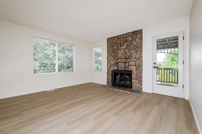 Building Photo - **Fully Remodeled 3+ Bedroom Home with Large Wraparound Deck – AVAILABLE NOW FOR RENT**