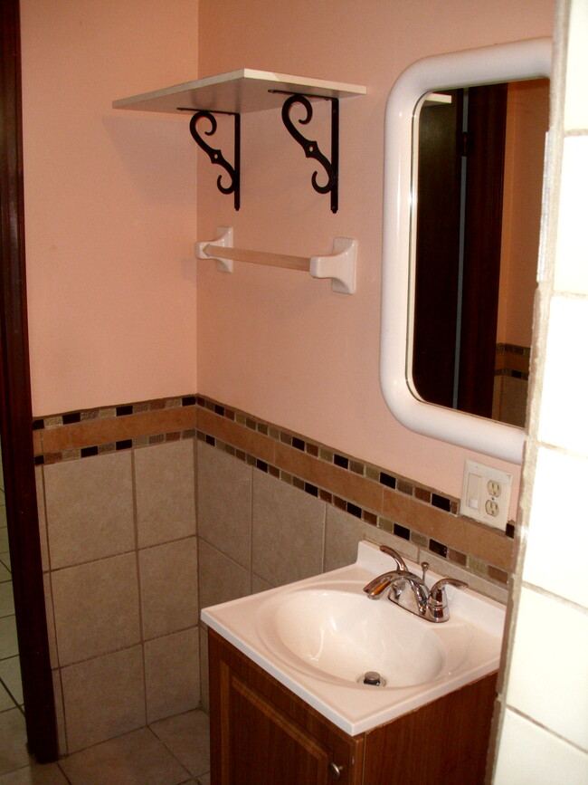 Decorative wall Mirror and Sink - 2177 Kings Mountain Dr NE