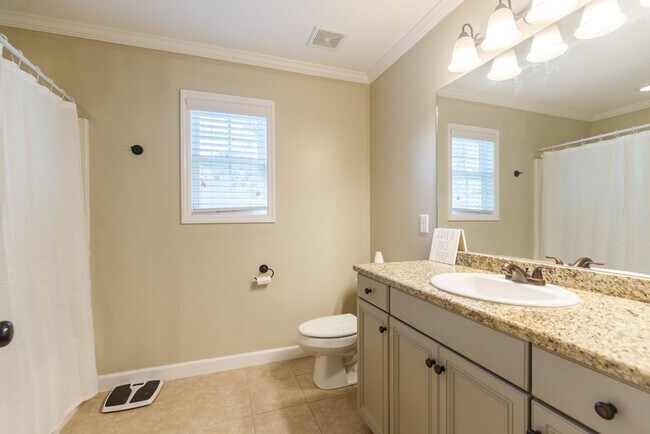 Building Photo - Modern 4-Bedroom Home with Screened Porch ...