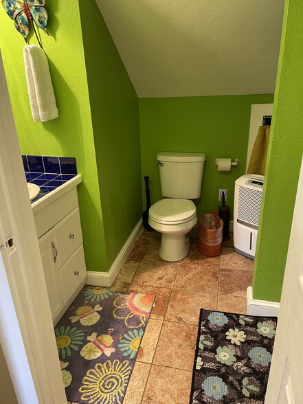 Bathroom off k itchen with dehumidifier - 540 E Taylor St