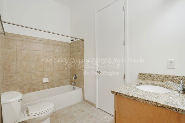 Building Photo - 711 Cosmopolitan Dr NE