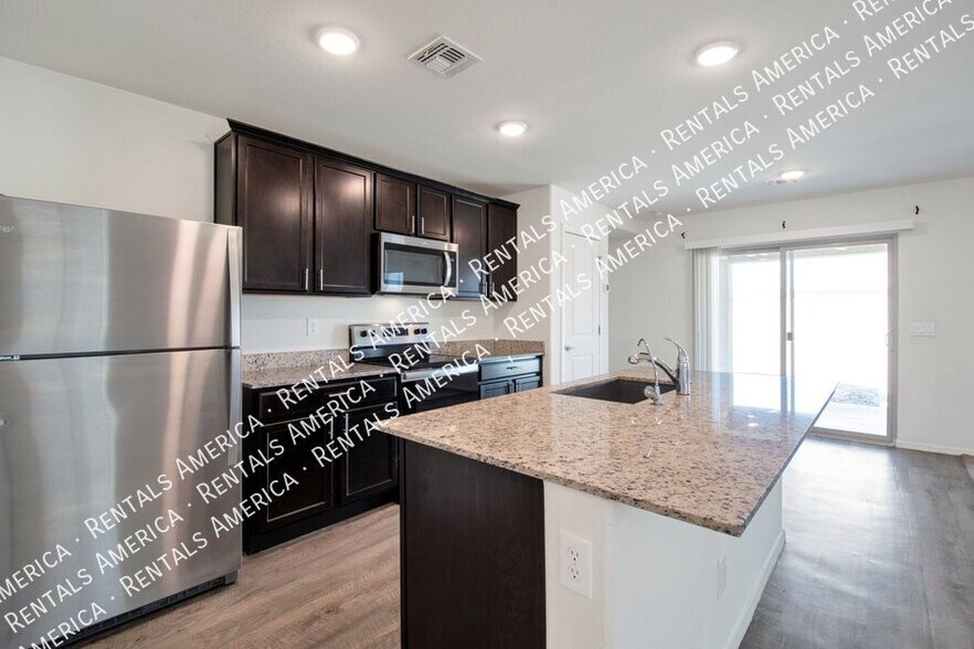 Building Photo - 1560 E Demain Dr