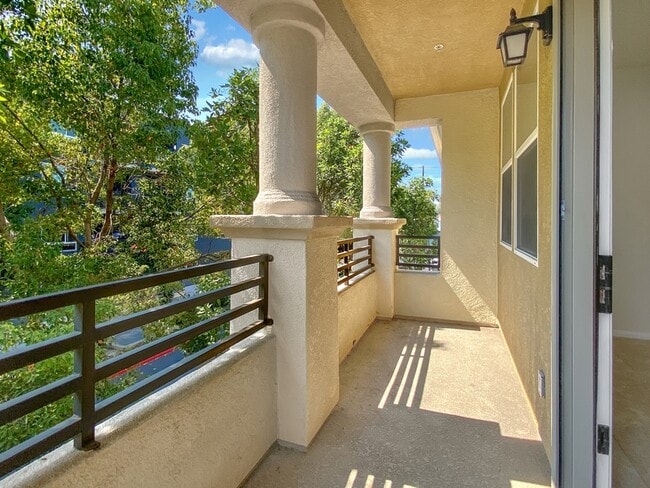 Building Photo - 8808 Promenade N Pl