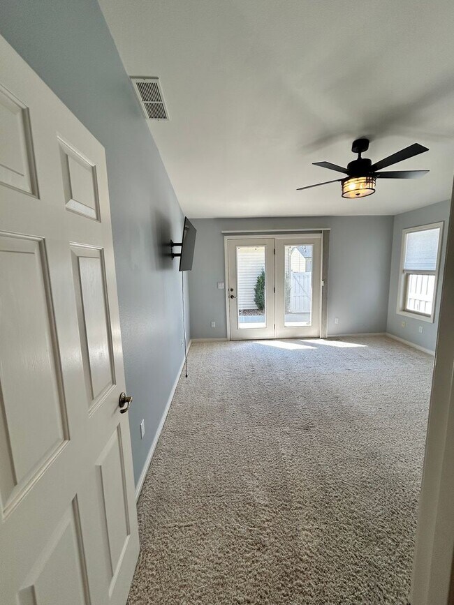 Building Photo - Spacious Duplex with 3-Car Garage & Private Patio!