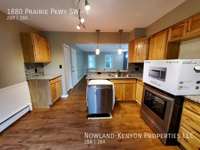 Building Photo - 1880 Prairie Pkwy SW - E- 2 beds, 1 full bath