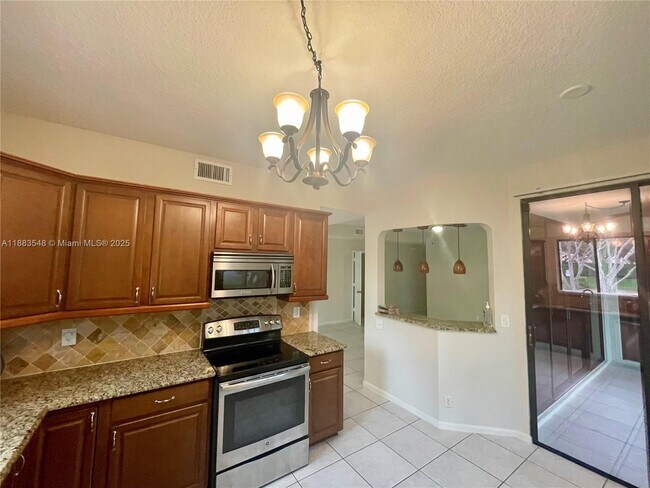 Building Photo - 7525 NW 61st Terrace