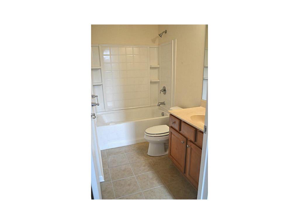 Lower Floor, Full Bath. Entrance from Bedroom and Den. - 12668 Hollice Ln