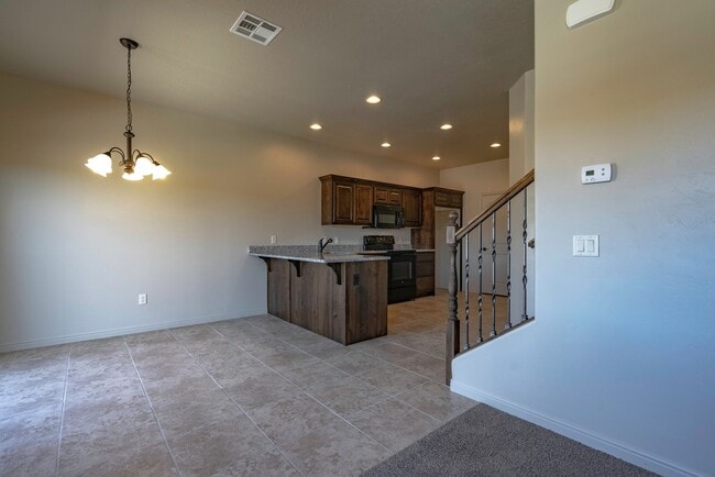 Building Photo - Townhome available in Millcreek Springs with a community pool!