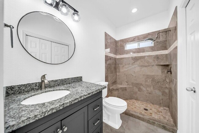 Building Photo - Welcome to this charming Craftsman-style residence nestled in the serene community of Lake Conroe...