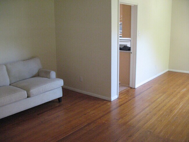Living Room / Dining Room & "back" Door to Kitchen - 3121 W Wyoming Ave