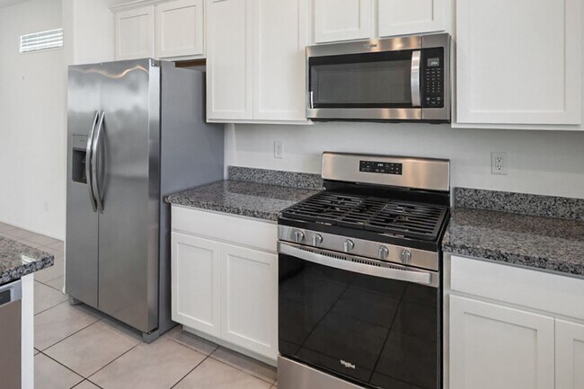 Building Photo - 10589 Sariah Skye Ave