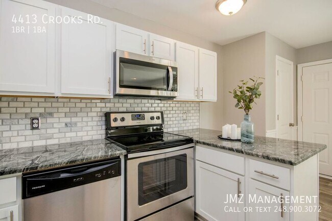 Building Photo - COMPLETELY UPDATED RANCH STYLE PRIVATE ENT...