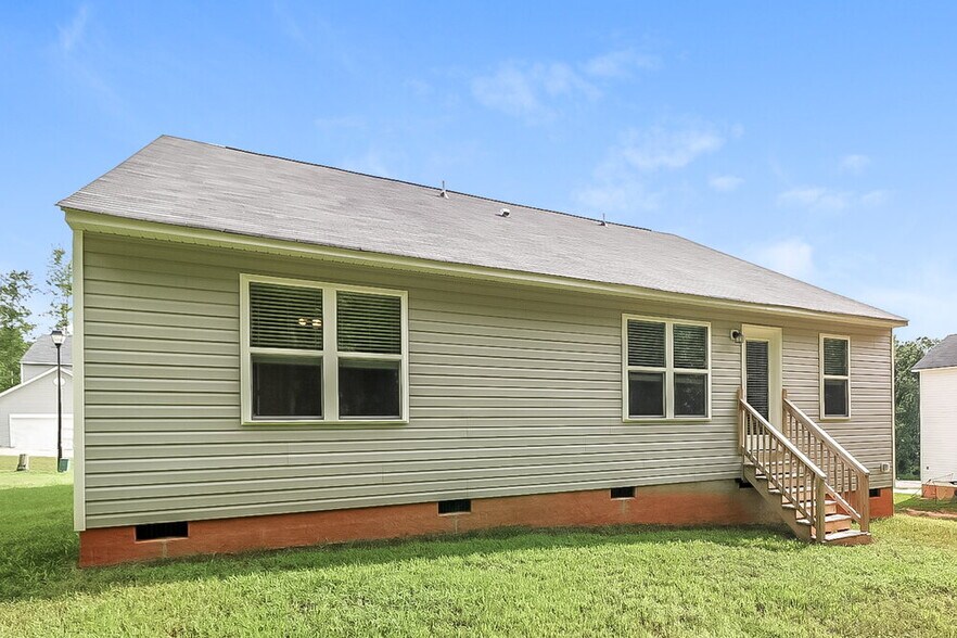 Building Photo - 9 Badger Pass Dr