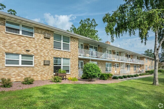 Building Photo - Modern Living: Experience Our Remodeled Apartment behind Hilldale Mall