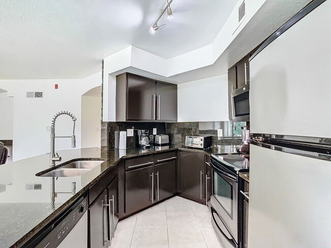 Building Photo - Westpointe Boulevard, Orlando, FL 32835 - 1 BR 1 BA condo