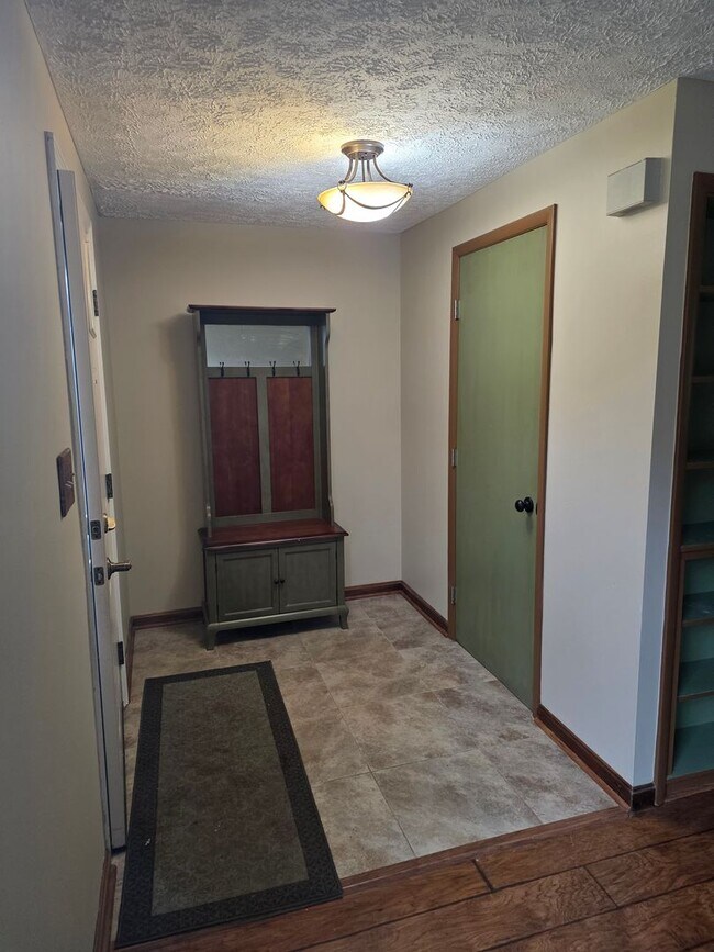 Building Photo - Serene Living in a Quiet Lakeside Community