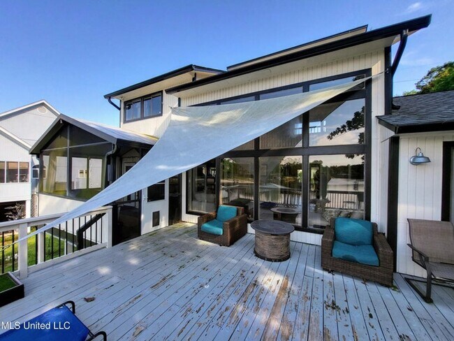 Building Photo - Riverfront Living with Private Boat Launch