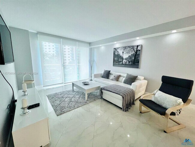 Building Photo - 19380 Collins Ave