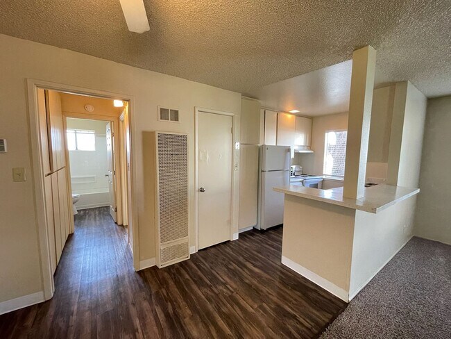 Building Photo - Downstairs 1-Bedroom Apartment, Private Patio, New Carpet & On-Site Laundry