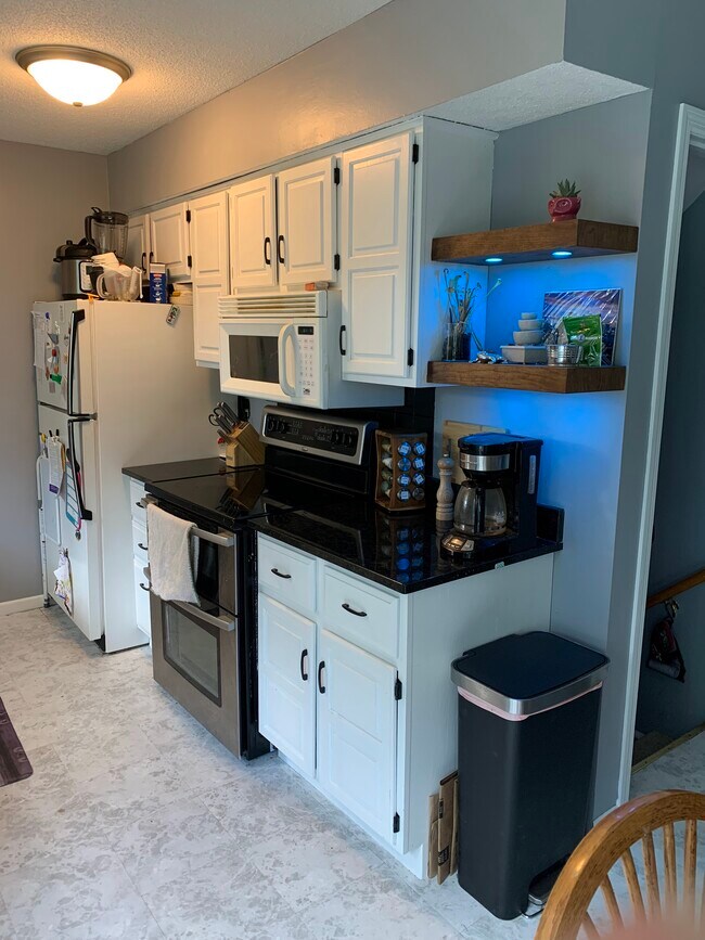 Lit shelving - 620 114th Ln NE