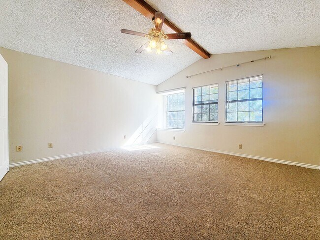 Building Photo - Warm & Inviting 4BR / 2.5BA Home with Covered Deck and 2-Car Garage