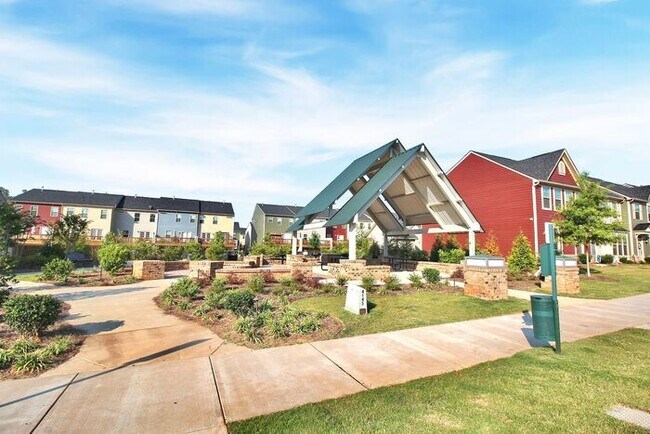 Building Photo - Stunning 3 Story 3BD/2+2HalfBA Townhome in...