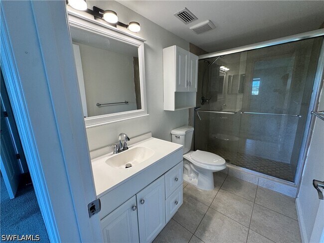 Building Photo - 12250 Tamiami Trl E