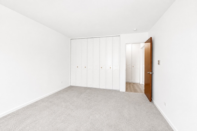 Building Photo - Spacious Rehabbed 1-Bedroom at The Vine | Private Balcony + Parking