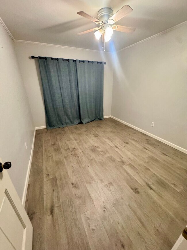 Building Photo - Beautiful corner lot. This home is very sp...