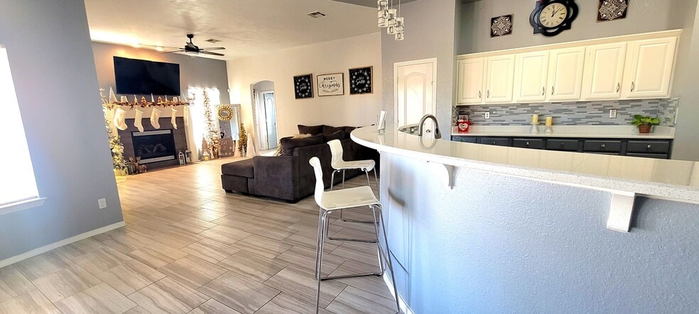 living room connects with kitchen - 13418 Emerald Tide Way