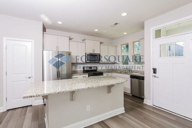 Building Photo - Stylish End-Unit Townhome with Open Floor Plan, Modern Kitchen & 1-Car Garage – Wendell, NC