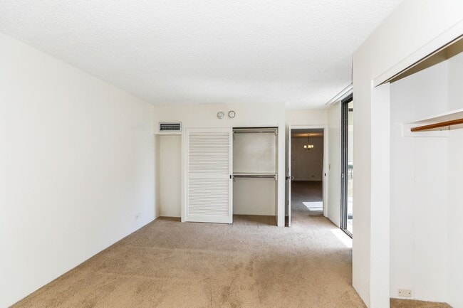 Building Photo - Aloha Towers - 2 bedroom, 2 bath corner unit with 1 covered parking stall