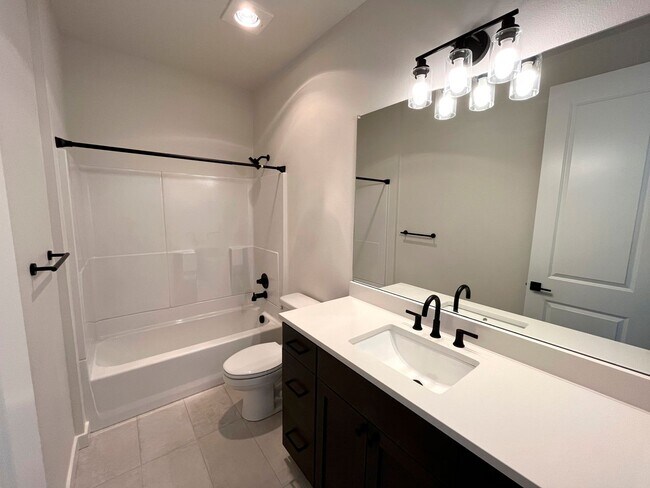 Building Photo - Newly Built Townhome-Style Unit with Laundry, A/C, Private Patio!