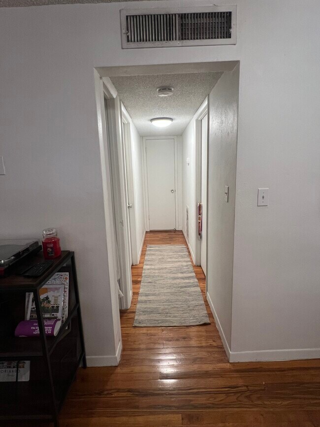 Hallway to Bedroom, BA and storage - 320 Lakeview St
