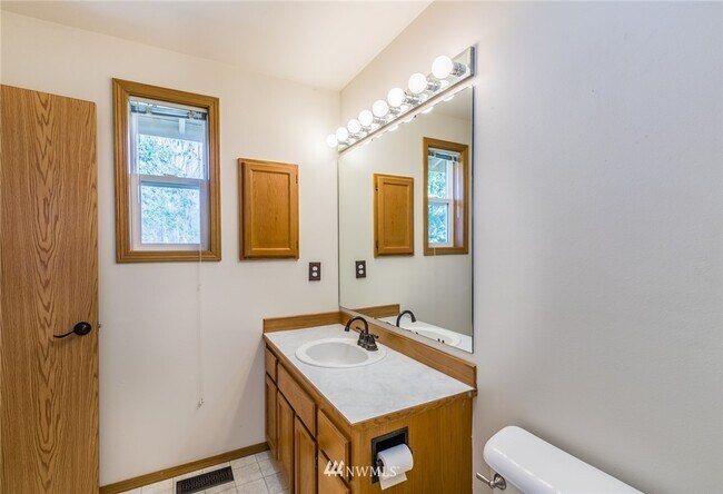 Bathroom attached to primary bedroom - 10205 7th Pl SE