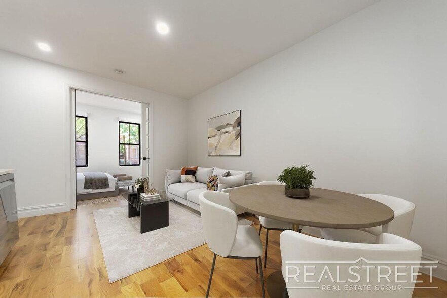 Building Photo - STUNNING 4+ BED 3 BATH DUPLEX + YARD IN PRIME BUSHWICK TOWNHOUSE