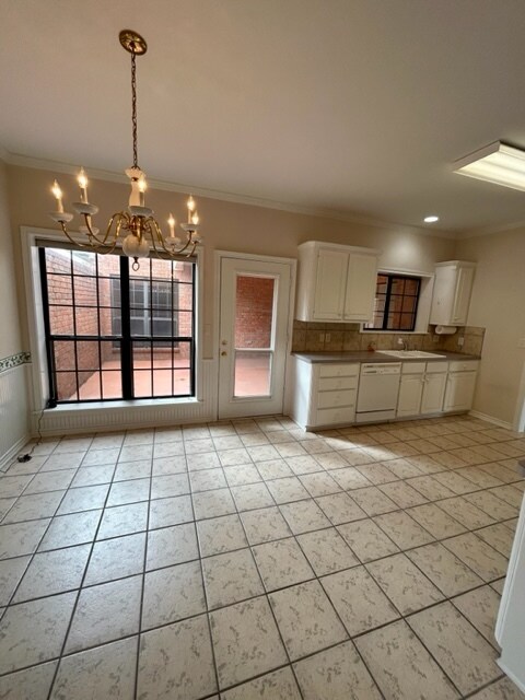 Kitchen and dining area looking towards courtyard - 806 Torribrooke Ln