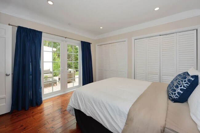 Building Photo - Welcome to this beautifully updated Spanis...