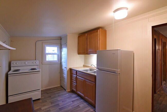 Building Photo - Half Off First Full Month's Rent! Rear Home Nestled In Texas Tech and Downtown Metro Area