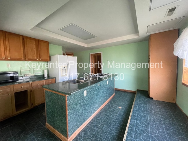 Building Photo - Cozy 3BR/2BA Home with Deck & Yard – Great Greenfield Location