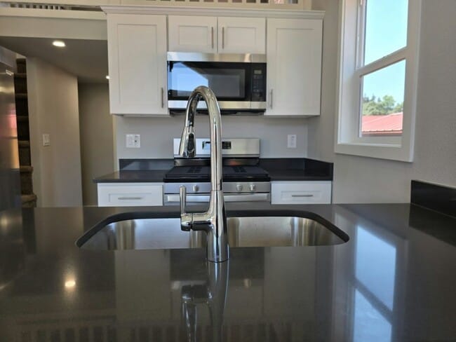 Building Photo - 8372 Enchanted Way SE