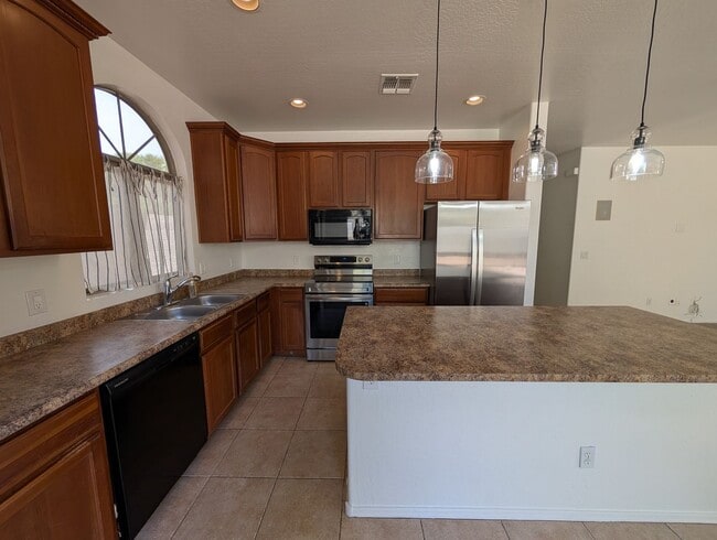 Building Photo - 3 Bedroom Plus Den