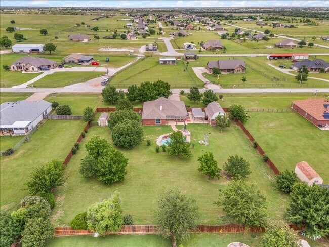 Building Photo - Luxury Lease on 1+ Acre with Saltwater Pool & Workshop in Ponder ISD!