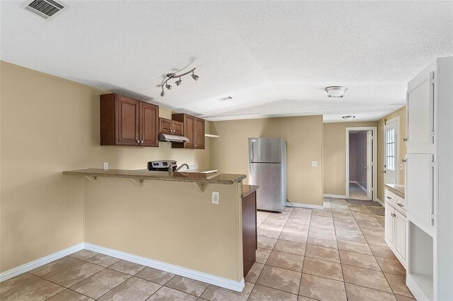 Building Photo - 14702 Scarlet Oak Dr