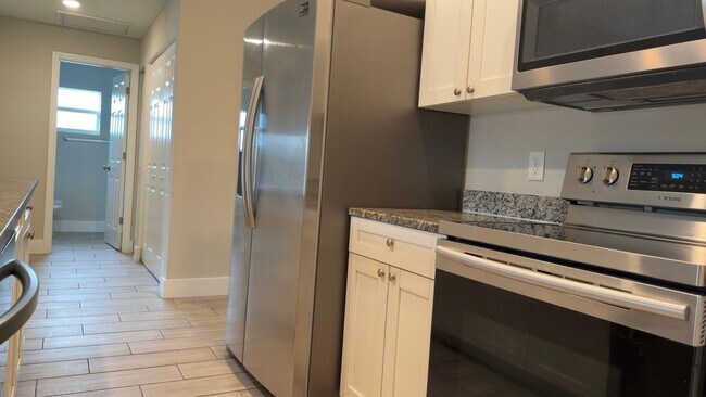 Building Photo - Duplex for rent on freshwater canal