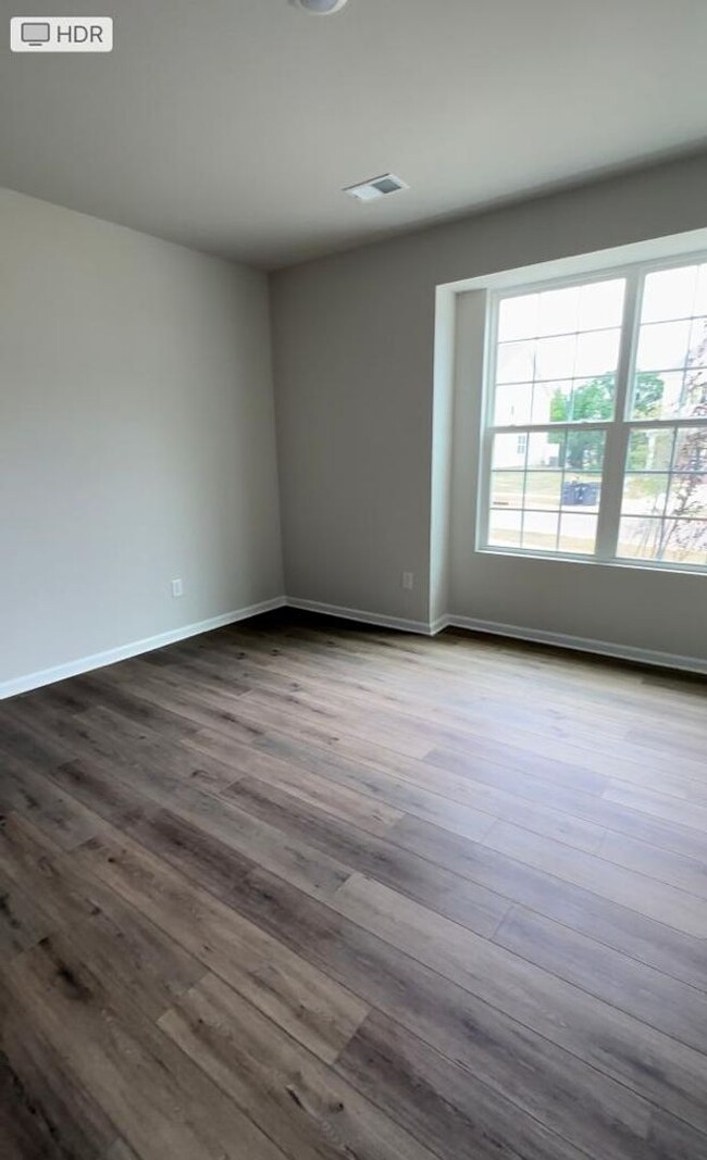 Building Photo - Brand New Large, 4BR End-Unit townhome in ...