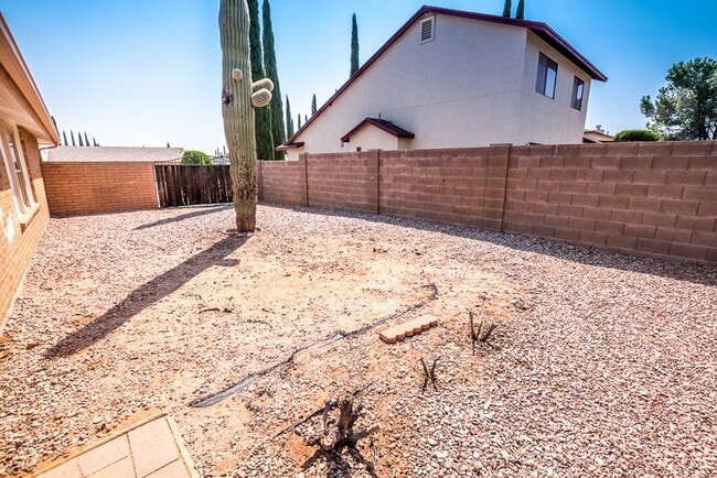 Building Photo - Contemporary home with 3 bedrooms, 2 bath, 2 car garage, A/C, Fenced Yard