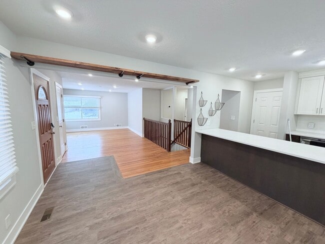 Building Photo - Spacious 4-Bedroom Home with Pond Views & EV-Ready Garage – Bloomington!!